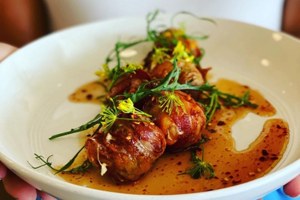 Close-up photo of duck wraps on a plate at Parish Restaurant in Monroe, Louisiana